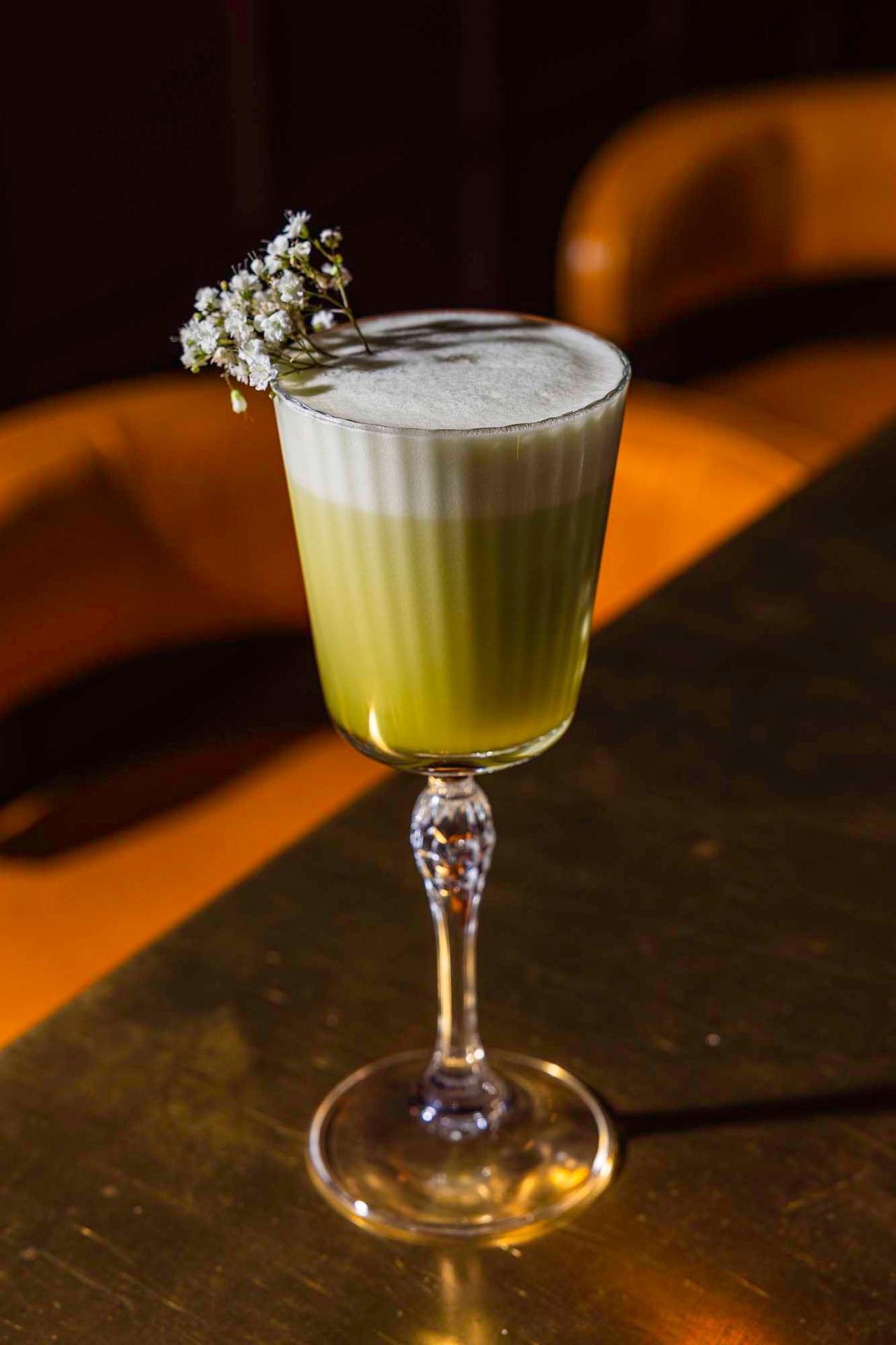 The Seeing Green is an easy-sipping cocktail made with fresh-pressed cucumber juice, gin, dry vermouth, matcha syrup and egg white